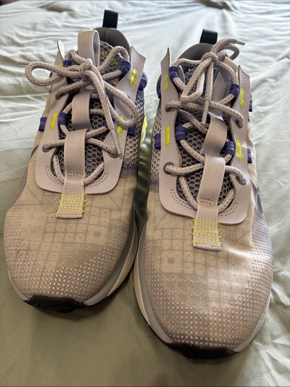 Nike men 10.5 Light Gray Athletic Sneakers with Purple & Yellow Accents